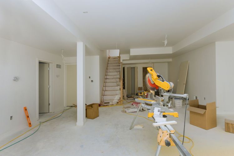 The progress of a home renovation to improve efficiency.