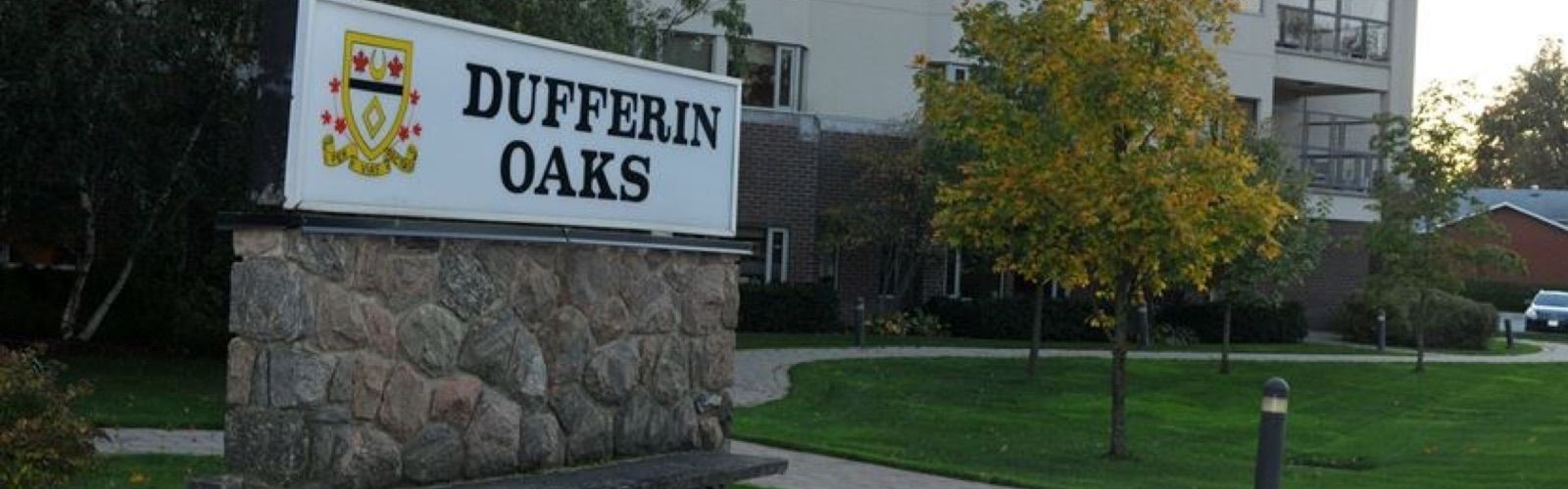Dufferin Oaks Long Term Care Home sign out front of the building.