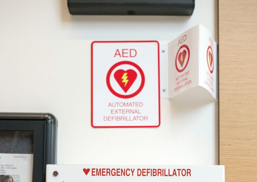 automated electronic defibrillator location sign