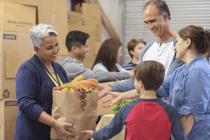 Food is handed out at a food bank.
