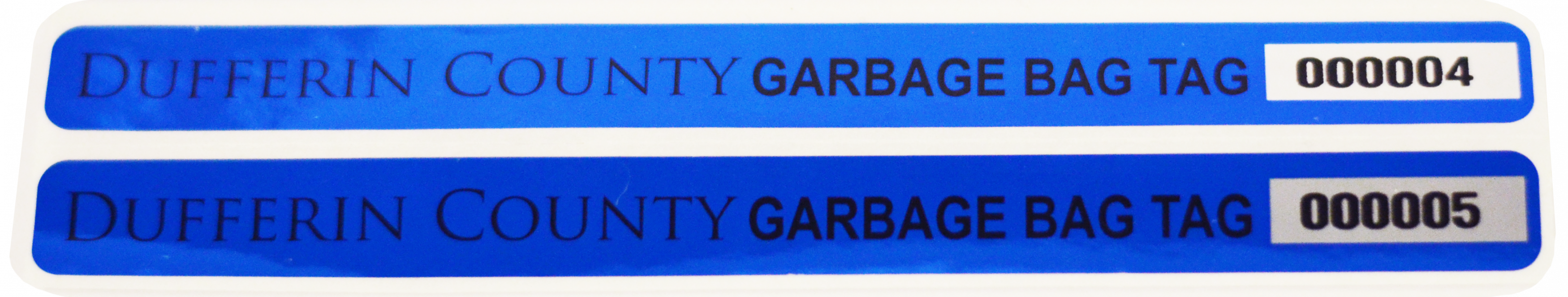 long thin blue stickers on a sheet of paper that say Dufferin County Garbage Bag Tag