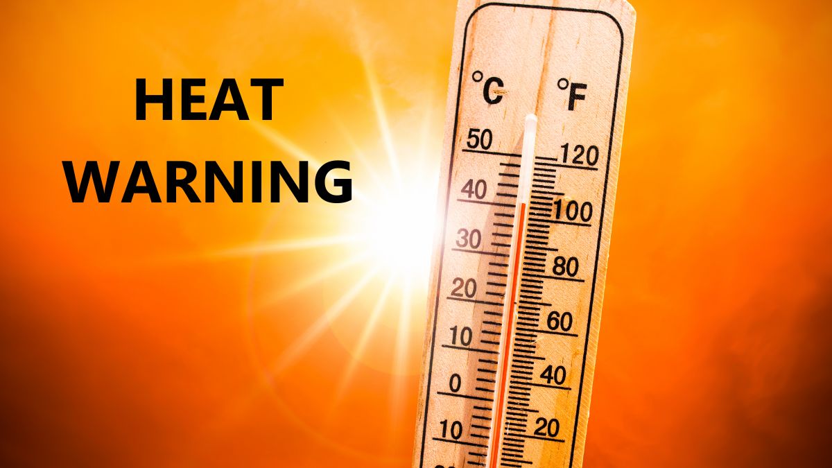 Thermometre with sun behind heat warning