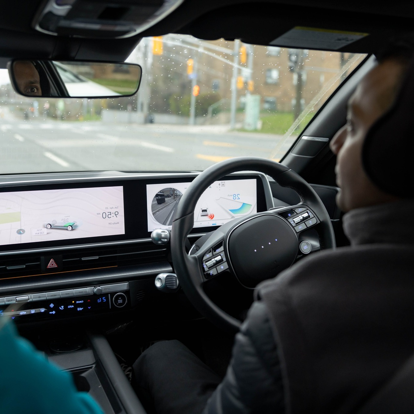 A man test-drives an electric vehicle