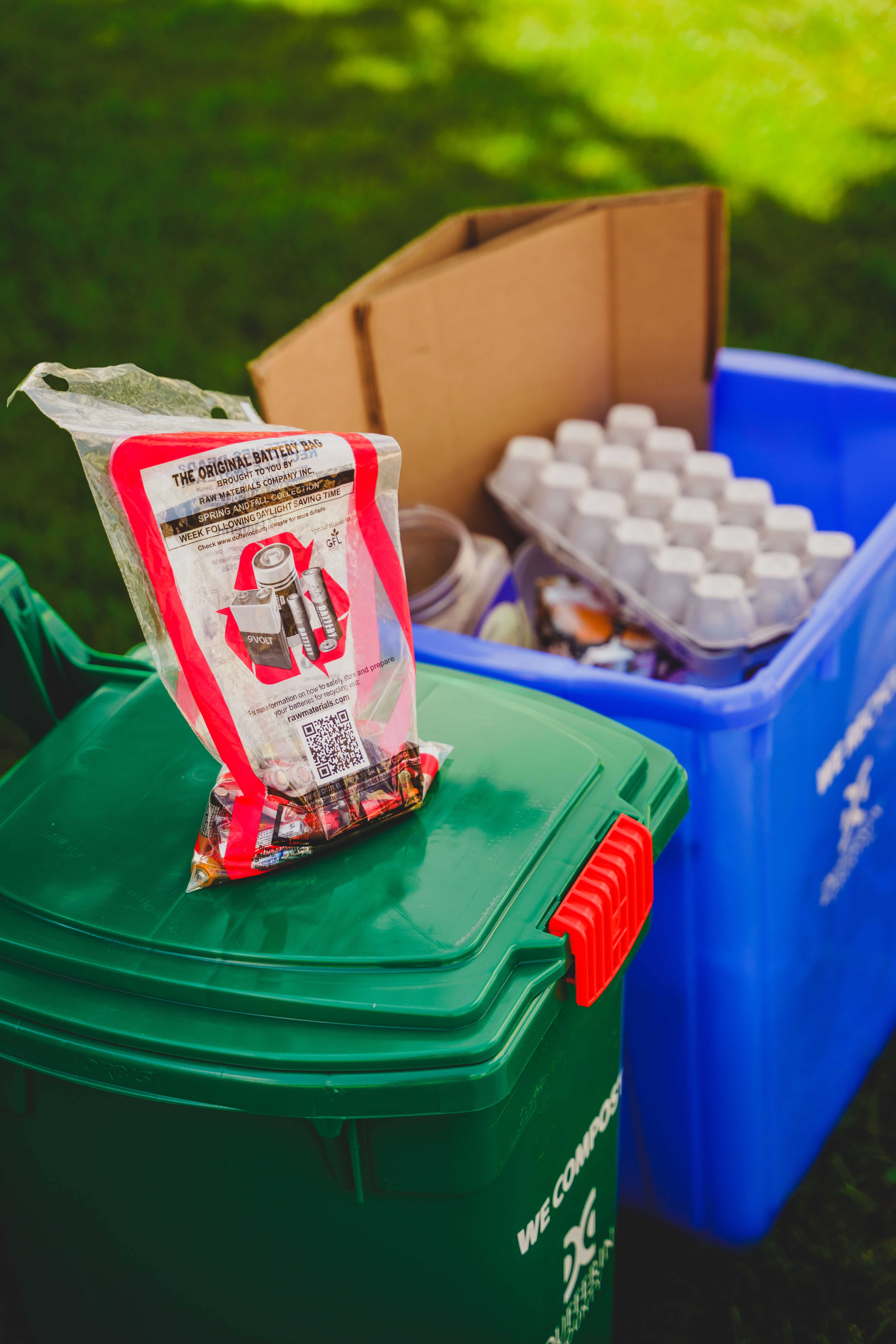 Battery bags on green bin