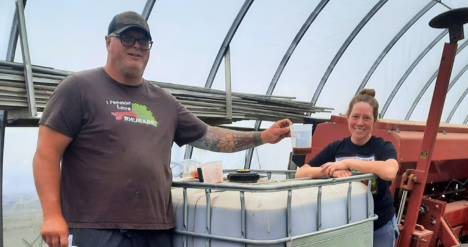 Brian and Jeanette French stand with their first tote of product.
