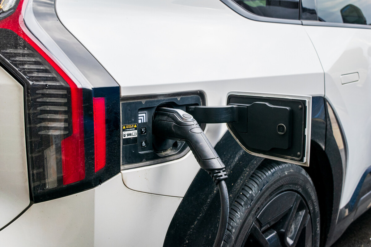 EV charging white car